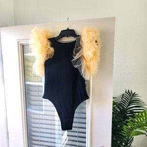Xela and Vic, bodysuit black, with tulle on the shoulders